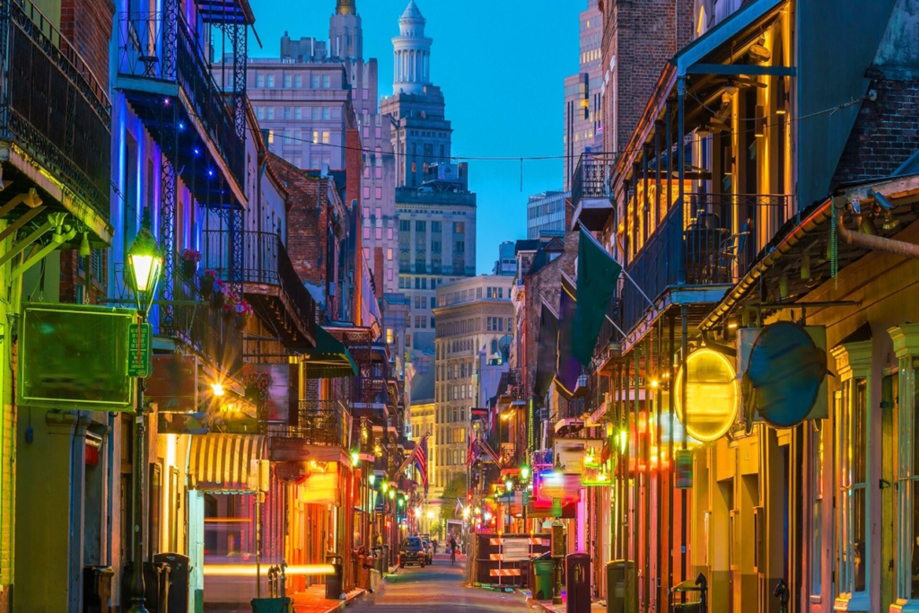 A lively street scene in the French Quarter during the festival is the best place to visit in April